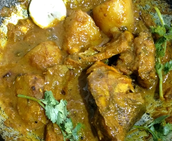 The marinated  roopchand fish chunks are fried and then simmered in a thick gravy made with tomatoes, onions, garlic and ginger and sometimes added with potatoes finished in a warm, spicy, cumin, coriander flavored sauce and this is How to make alu diye roopchand macher kalia in Bengali style